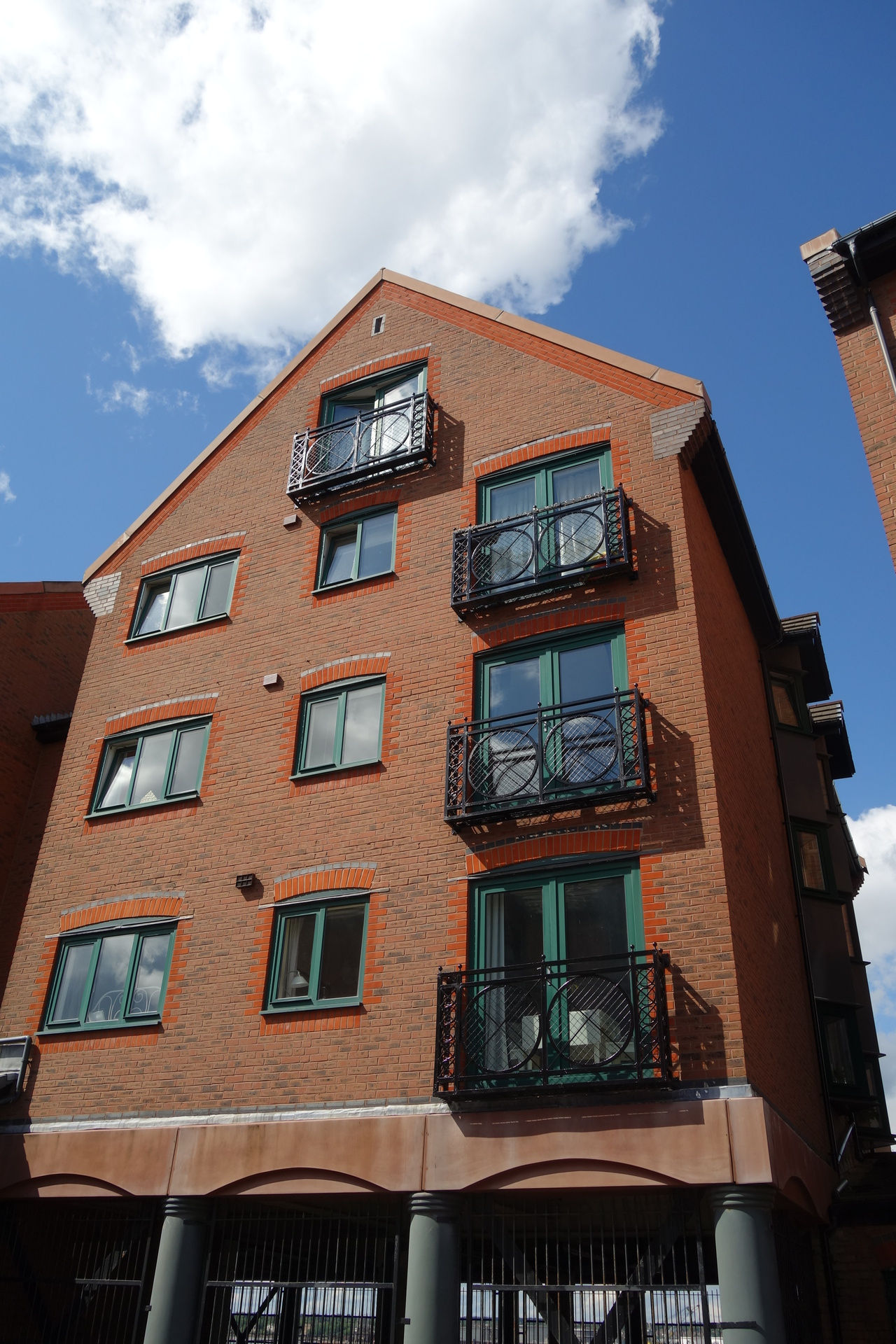 Photo of a tall brick building
