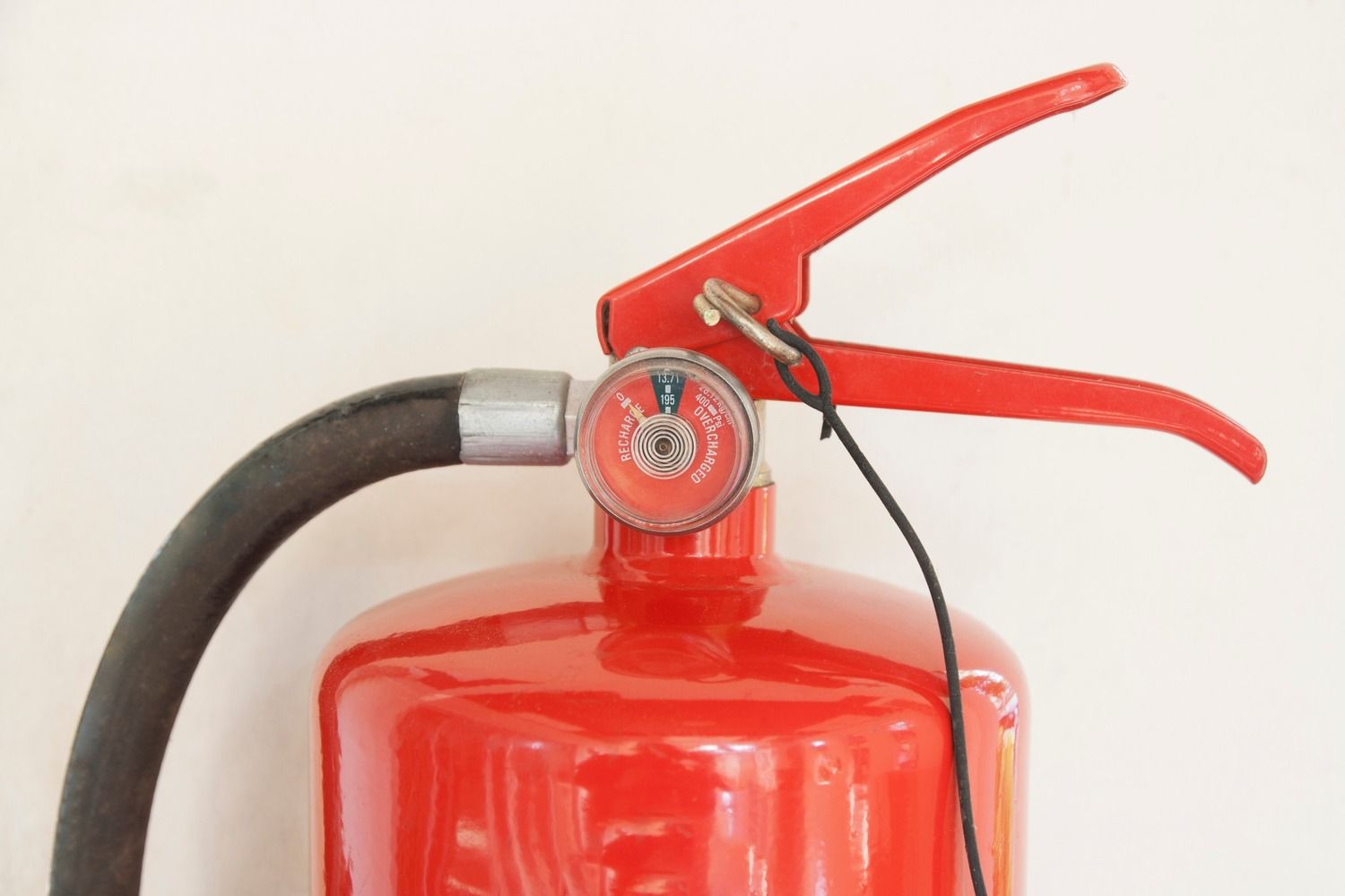 A red fire extinguisher